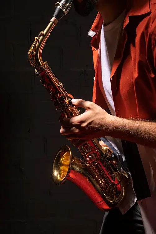 side-view-male-musician-playing-saxophone1 (1)